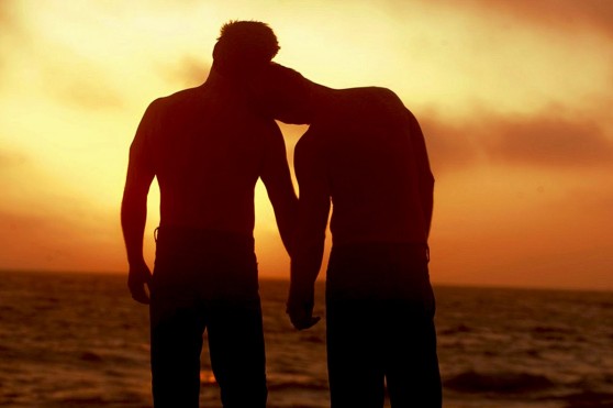 men walking into sunset
